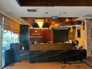 a lobby of a hotel with a reception counter at Ankara Royal Hotel in Ankara