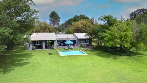 an aerial view of a house with a swimming pool at Vaal River House @ Lochvaal in Vanderbijlpark