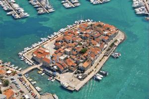 an aerial view of a small island in a harbor at Tribunj House in Tribunj