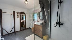 a bathroom with a sink and a mirror at Le gîte de nathye in Saint-Junien +20 photos