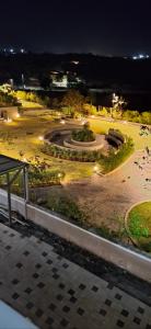 a view of a park at night with lights at Soni & Avi View Apartment in Igatpuri