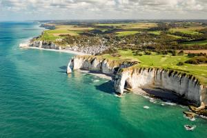 an aerial view of a golf course on the ocean at STUDIO 88 in Sainte-Adresse