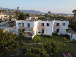 an aerial view of a white house at Zikas apartments in Marmari
