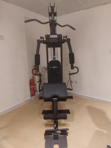a black office chair sitting in a room at HARF22-101-01 1br apt in AD in Abu Dhabi