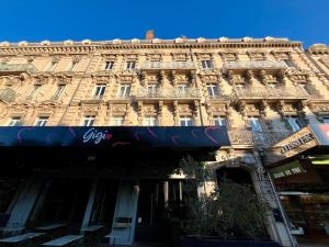 a building with graffiti on the side of it at Chez MARIE in Valence