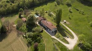 an aerial view of a house in a field at Gîte la Planta de Cossey 2 in Claix