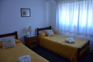 En eller flere senge i et værelse på Hotel Santa Eulalia I + 18 billeder