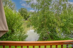 a view of a body of water from a bench at Looby Lodge in Tattershall