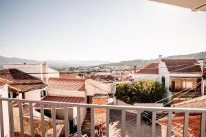 a view of a city from a balcony at Casa da avo Rita in Pêro Viseu