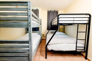 a bunk bed room with two bunk beds at Beach condo with 3 bedrooms and ocean views in Rio Grande