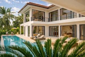an image of a villa with a swimming pool at Villa Nomada Exclusive Modern Seaview Spa and Wellness Villa with Daily Housekeeping 5 Bedrooms Sauna Ice Bath and 20 Meter Private Saltwater Pool in Ban Bang Po