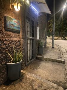 a door to a building with plants in front of it at b&b ERCOLANO Scavi in Ercolano