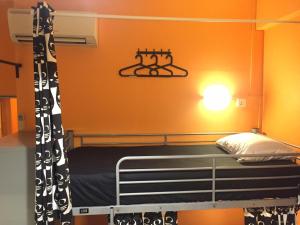 Postel nebo postele na pokoji v ubytování CSW Hostel