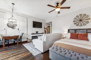 a bedroom with a bed and a ceiling fan at Bliss Retreat in Whitefish