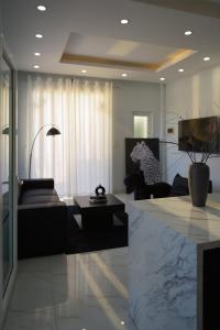 a living room with a couch and a table at 2Bi s Home Dalat 3 in Da Lat