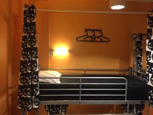 Postel nebo postele na pokoji v ubytování CSW Hostel