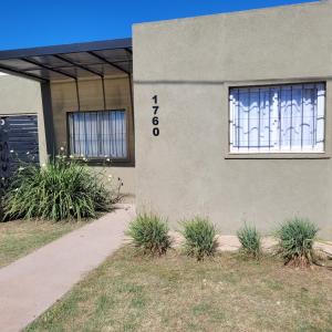 a building with a window on the side of it at Casa Nuup in Río Tercero