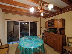 a kitchen with a table and a window in it at Gîte de la Forêt in Saint-Jeanvrin +3 photos