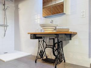 a bathroom counter with a sink and a shower at Coeur de pierre in Vallon-Pont-dʼArc +10 photos