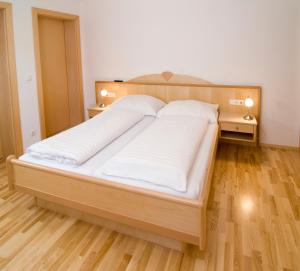 Postel nebo postele na pokoji v ubytování Appartement Kurz Top 1