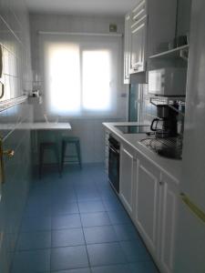 Cuisine ou kitchenette dans l'établissement Sea Apartment