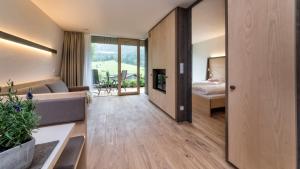 Ένα ή περισσότερα κρεβάτια σε δωμάτιο στο Villa Rainer Sexten