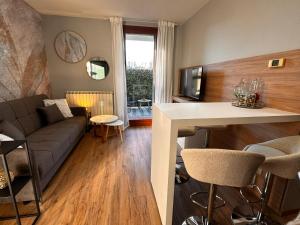 a living room with a couch and a table at Elite in Rovigo