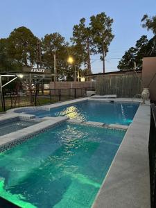 a swimming pool with blue water in a building at lo de Leo in Concordia