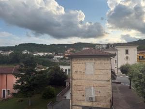 a view of a city with a building in the foreground at Casa Vacanze Nonna Mena in Fontechiari