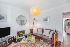 a living room with a couch and a tv at 2 Bed in Whitstable oc-w31887 in Whitstable