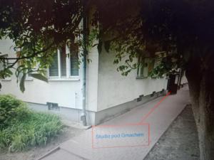 a building with a red line that says student post concern at Studio pod Gmachem in Chełm