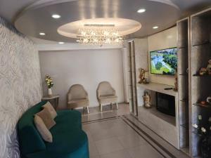 Televisi dan/atau pusat hiburan di Hotel Rocío