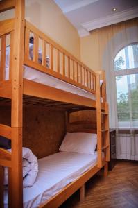 Postel nebo postele na pokoji v ubytování Golden Globus Hostel