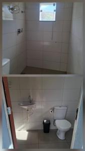 a small bathroom with a toilet and a sink at Cantinho da Meirinha in Santana do Riacho