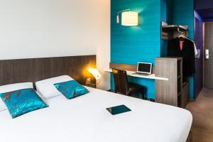Postel nebo postele na pokoji v ubytování Ibis Styles Lyon Centre - Gare Part Dieu