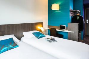 Postel nebo postele na pokoji v ubytování Ibis Styles Lyon Centre - Gare Part Dieu