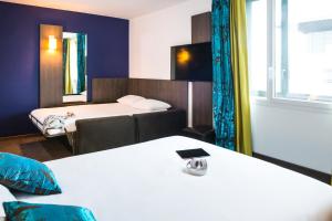 Postel nebo postele na pokoji v ubytování Ibis Styles Lyon Centre - Gare Part Dieu