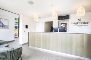 a lobby of a hospital with a reception desk at Nightelier Rye in Rye +90 photos