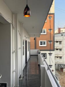 a hallway of a building with a balcony at R Square Homes in Bangalore