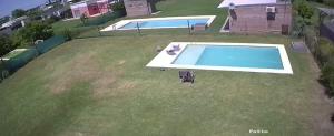 an aerial view of a yard with a swimming pool at Paz en Funes in Funes