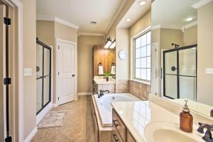 a bathroom with a tub and a sink at The Hub in Bella Vista +37 photos