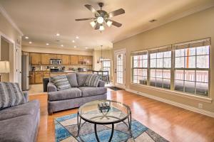 a living room with a couch and a table at The Hub in Bella Vista