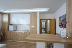 Cuina o zona de cuina de Garni Uni Elita Lux Hotel