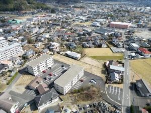 an aerial view of a city with buildings at ウエストワン サウス105Kawasemi in Hitoyoshi