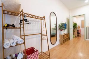 a room with a bunk bed and a mirror at StayX Central Suites Q1 in Ho Chi Minh City +21 photos