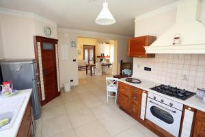 Kuchyň nebo kuchyňský kout v ubytování Apartment Larin