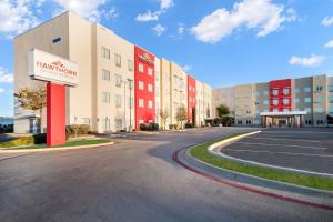 an empty street in front of a building at Hawthorn Suites by Wyndham Lubbock in Lubbock