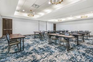 a large room with tables and chairs in it at Cambria Hotel Tampa-Brandon in Tampa +57 photos