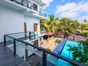 an aerial view of a building with a swimming pool at Omar Villa in Bentota