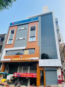 a building with a sign on the front of it at Hotel Shri Goverdhan in Bahraich